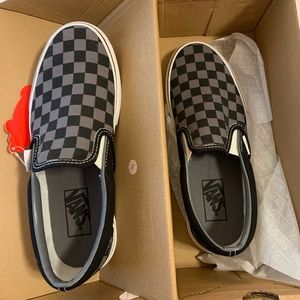 Vans checkered classic slip on’s